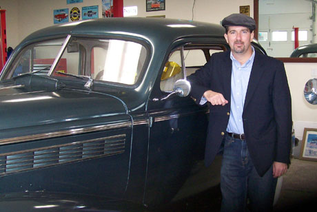 Keith Payne next to Classic Car